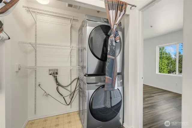 a close view of utility room with washer and dryer