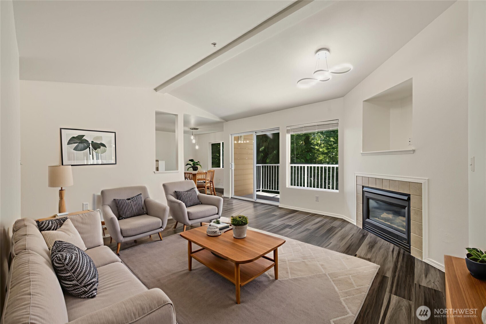 710 240th Way Southeast, Unit J302 Sammamish, WA 98074 - Photo 2 of 22 a living room with furniture and a large window
