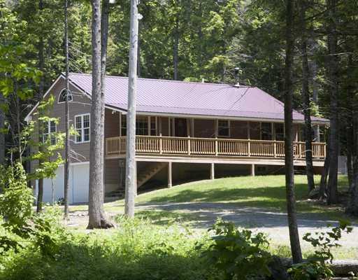 8 Beaver Brook Road Dover-Foxcroft, ME 04426 - Photo 1 of 25 Exterior Front. Meadow cut out in...