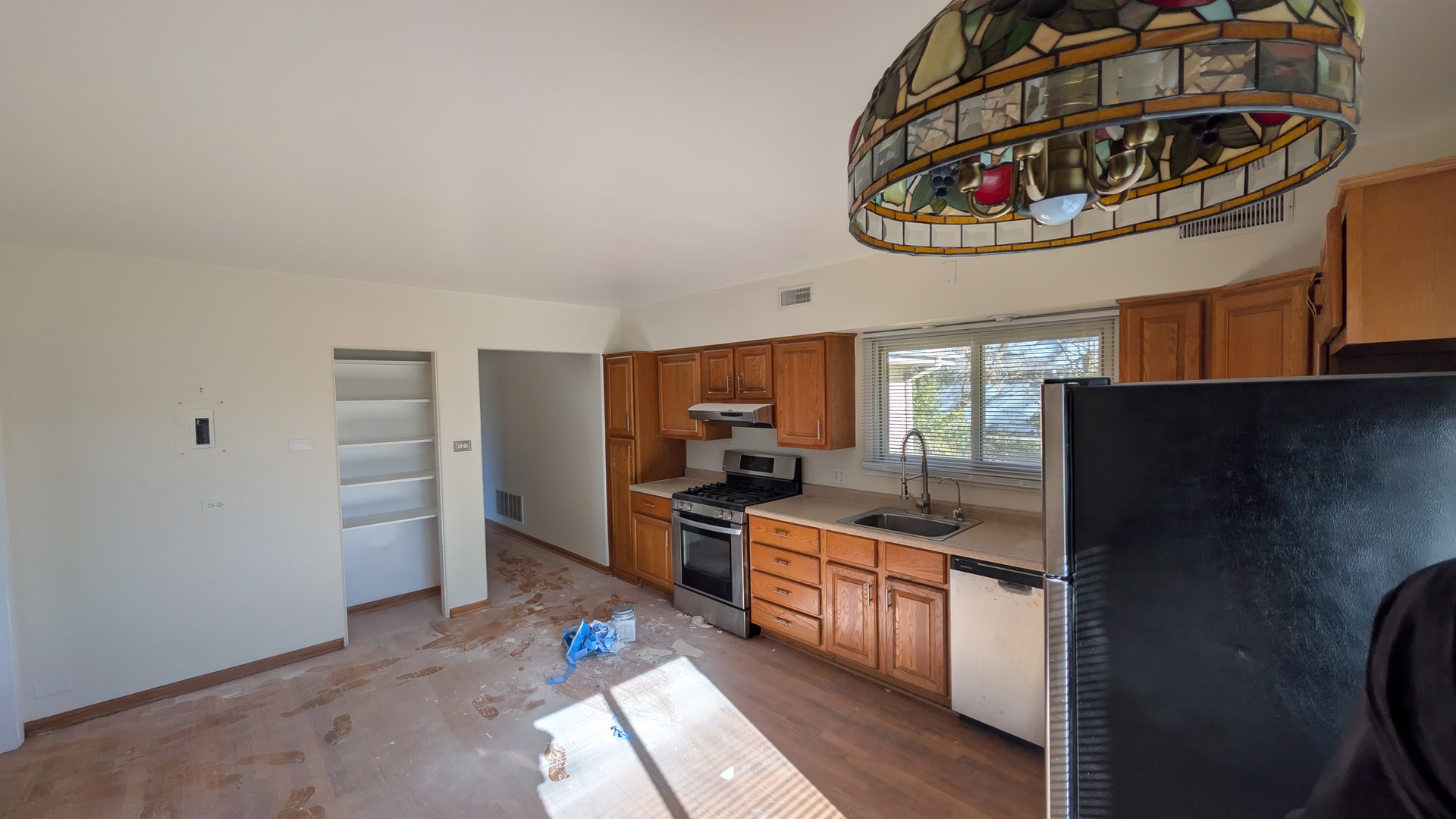 811 Hoyle Road Lombard, IL 60148 - Photo 13 of 22 a kitchen with stainless steel appliances granite countertop a refrigerator and a stove top oven