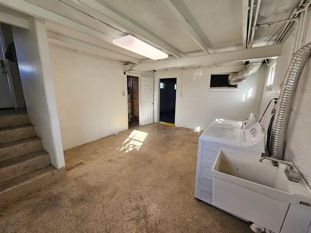 a view of a livingroom with furniture