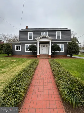 a front view of house with yard