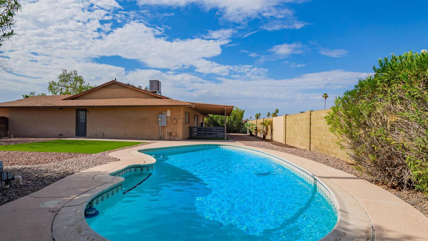 3929 South Pine Street Tempe, AZ 85282 - Photo 1 of 23 a view of a house with backyard and garden