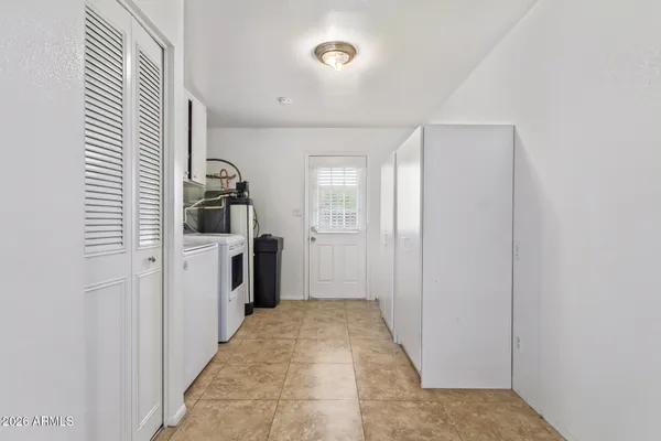 a view of a kitchen with a sink