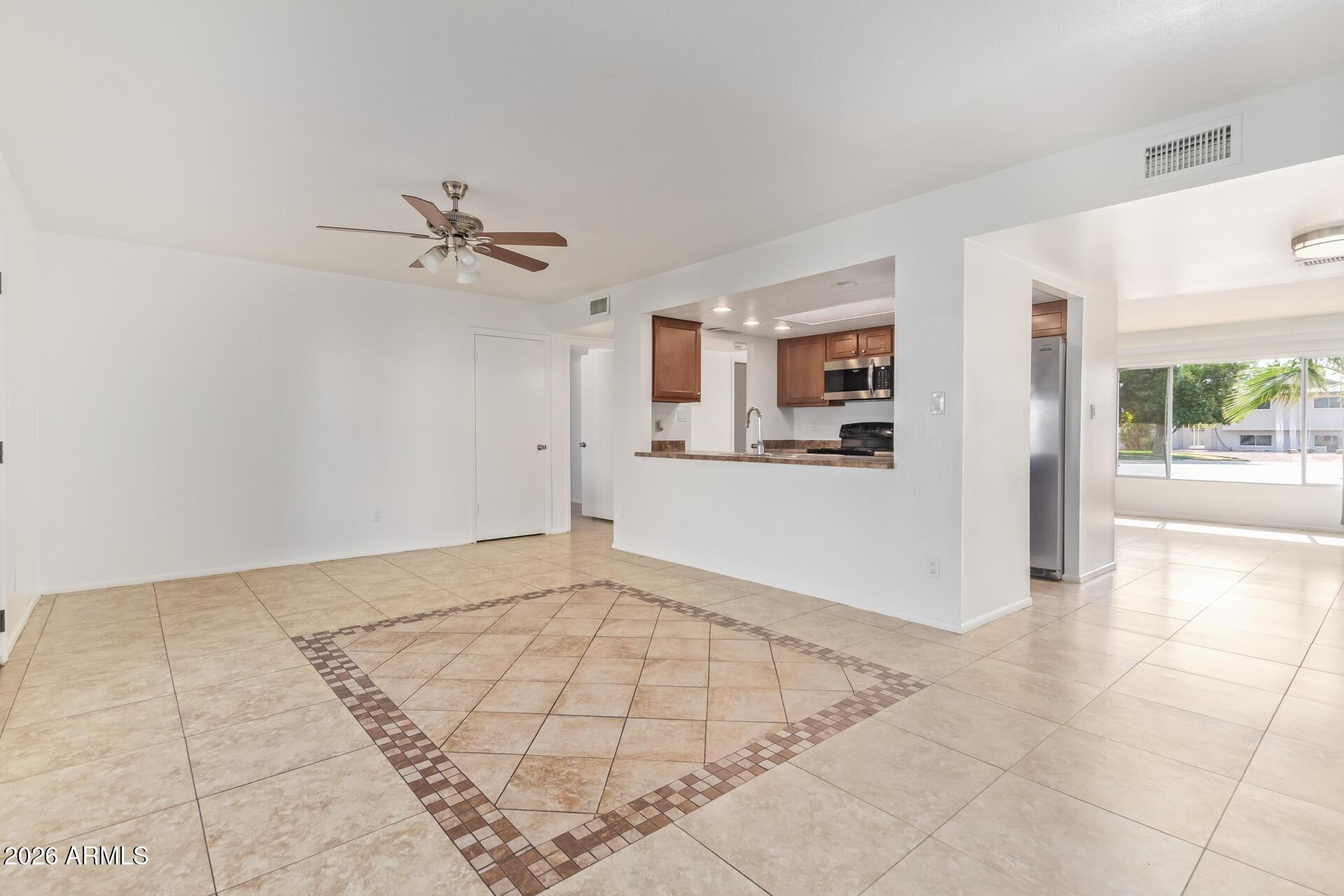 3929 South Pine Street Tempe, AZ 85282 - Photo 5 of 23 a view of a livingroom with a flat screen tv