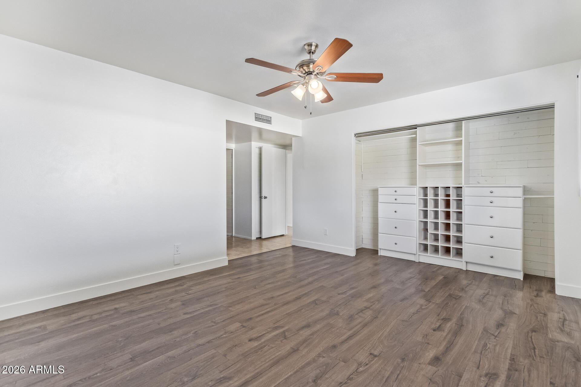 3929 South Pine Street Tempe, AZ 85282 - Photo 10 of 23 wooden floor in an empty room