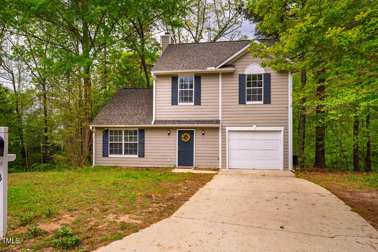 3 Little Stone Circle Durham, NC 27703 - Photo 3 of 27 a front view of a house with garden