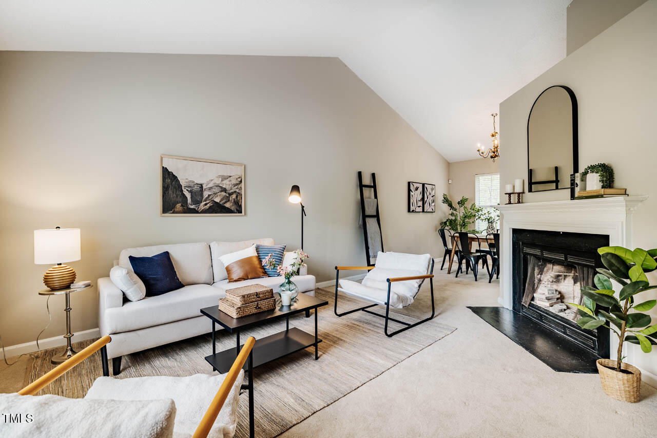 3 Little Stone Circle Durham, NC 27703 - Photo 4 of 27 a living room with furniture and a fireplace