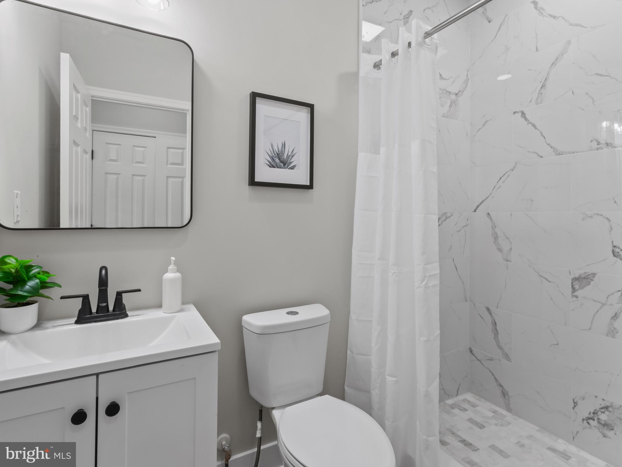 5 North Clinton Street Baltimore, MD 21224 - Photo 13 of 30 Primary bathroom