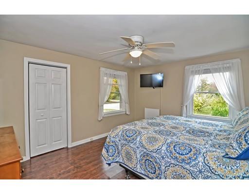 14 Tanner Road Webster, MA 01570 - Photo 17 of 28 a bedroom with a bed and a window