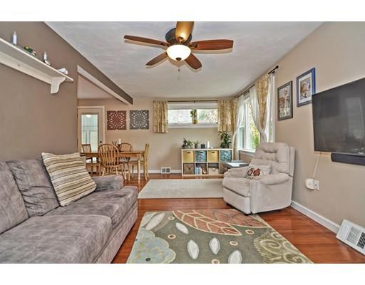 14 Tanner Road Webster, MA 01570 - Photo 7 of 28 a living room with furniture and a flat screen tv