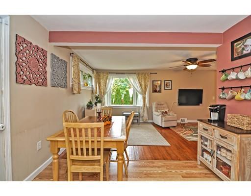 14 Tanner Road Webster, MA 01570 - Photo 9 of 28 a living room with furniture and a flat screen tv