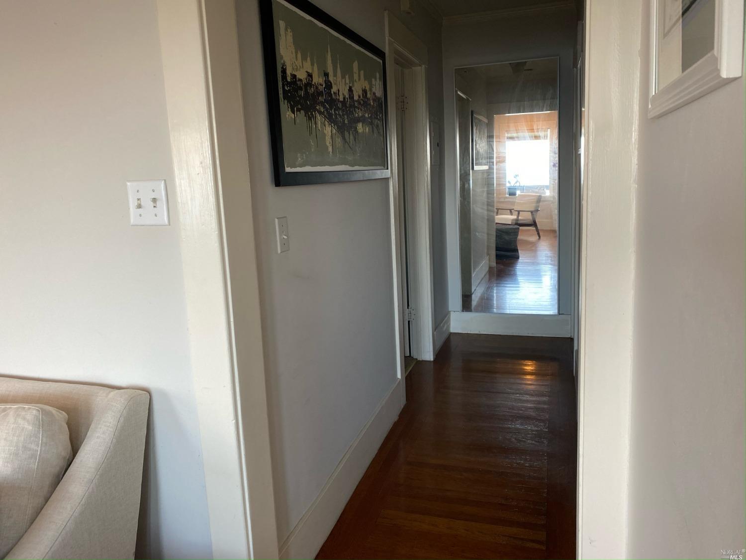 6 West Court, Unit B Sausalito, CA 94965 - Photo 7 of 9 a view of a hallway with wooden floor