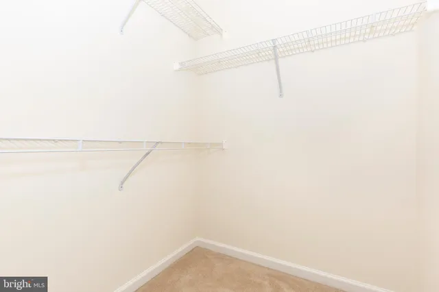 a view of small space with racks on the wall