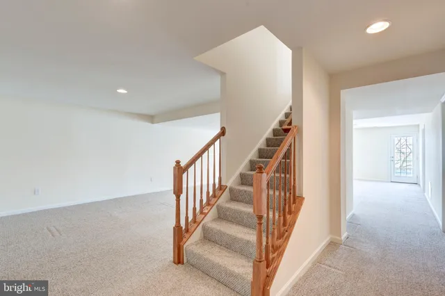 a view of a hallway with staircase