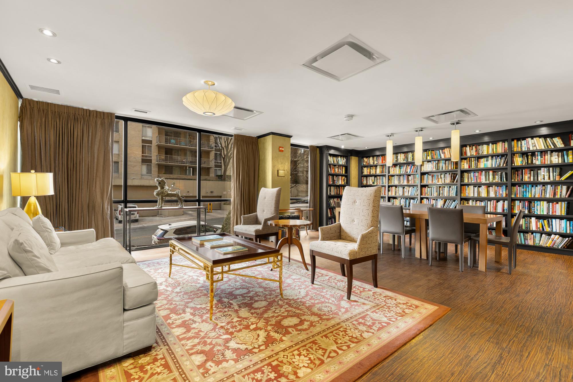 4620 North Park Avenue, Unit 1211E Chevy Chase, MD 20815 - Photo 26 of 37 a living room with lots of furniture and a rug