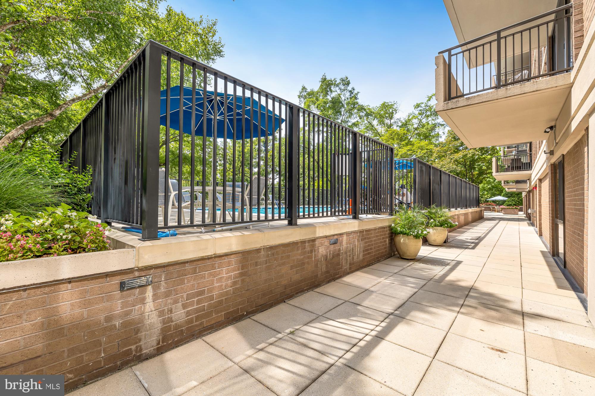 4620 North Park Avenue, Unit 1211E Chevy Chase, MD 20815 - Photo 33 of 37 a view of a house with backyard and sitting area