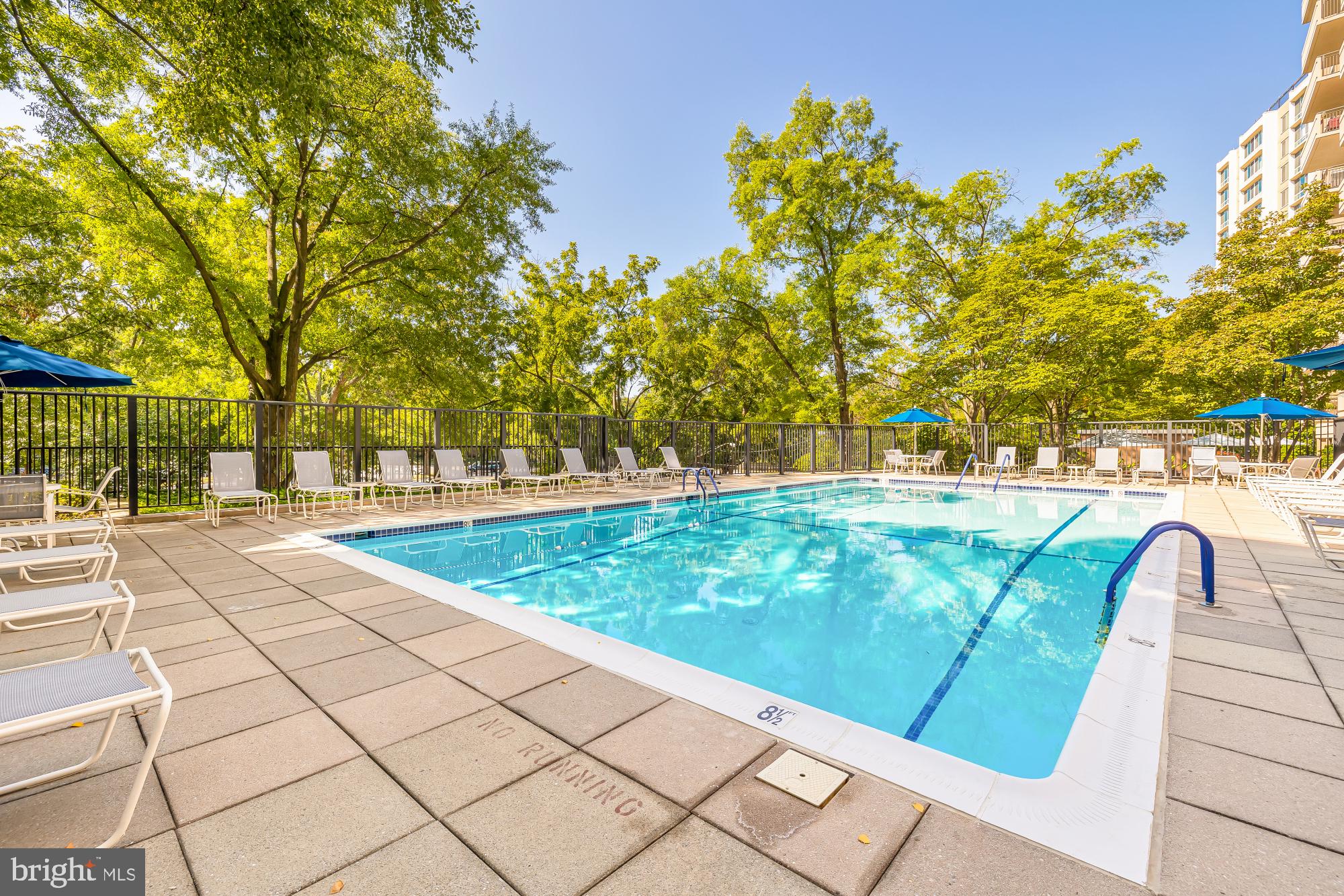 4620 North Park Avenue, Unit 1211E Chevy Chase, MD 20815 - Photo 34 of 37 a view of swimming pool with a patio