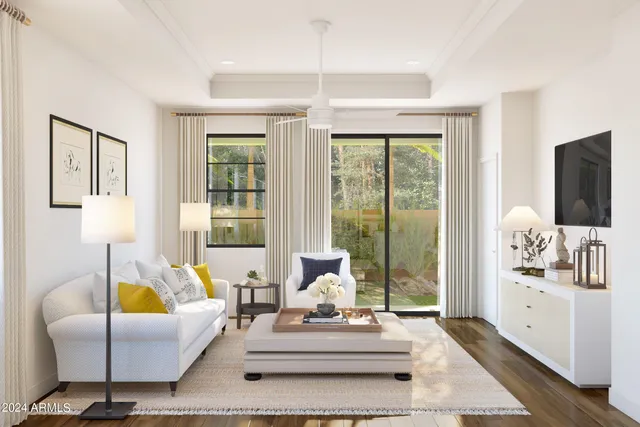 a living room with furniture large window and flat screen tv