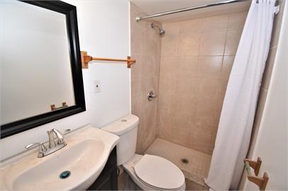 210 Chesterfield Road Pittsburgh, PA 15213 - Photo 3 of 11 a bathroom with a sink toilet and shower