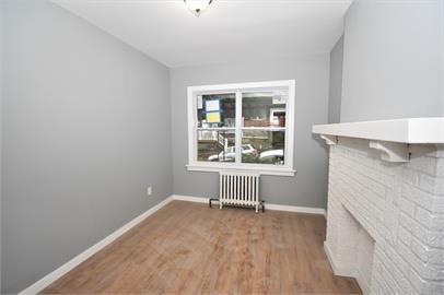 210 Chesterfield Road Pittsburgh, PA 15213 - Photo 4 of 11 an empty room with windows