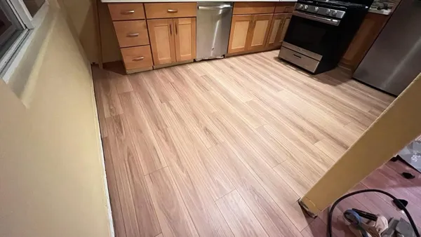 a view of a utility room with dryer and washer