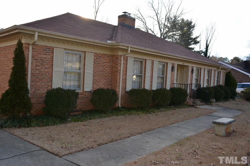2808 Glen Burnie Drive Raleigh, NC 27607 - Photo 22 of 23 a view of a house with backyard and garden