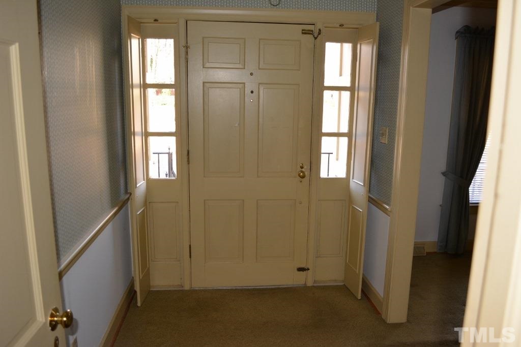 2808 Glen Burnie Drive Raleigh, NC 27607 - Photo 10 of 23 view of empty room with windows