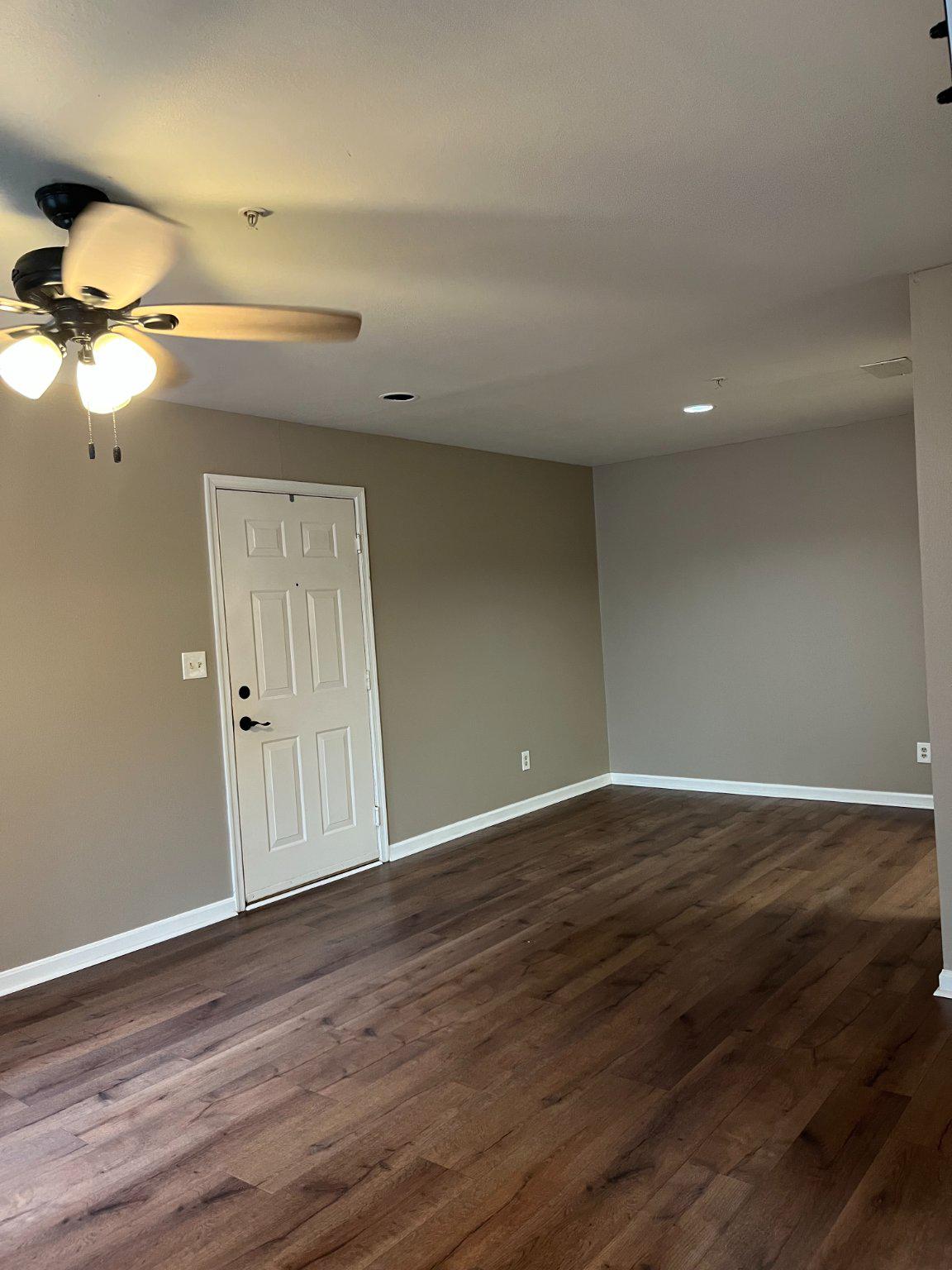 296 Canterbury Road, Unit 296J Bel Air, MD 21014 - Photo 4 of 13 a view of empty room with wooden floor and fan