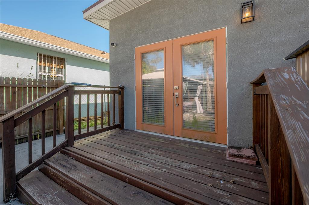 2341 West Chestnut Street Tampa, FL 33607 - Photo 41 of 42 a view of a balcony with wooden floor