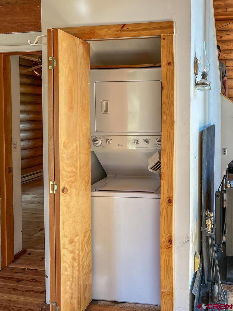 454 Estates Circle Road Pagosa Springs, CO 81147 - Photo 17 of 35 a utility room with a washer and dryer