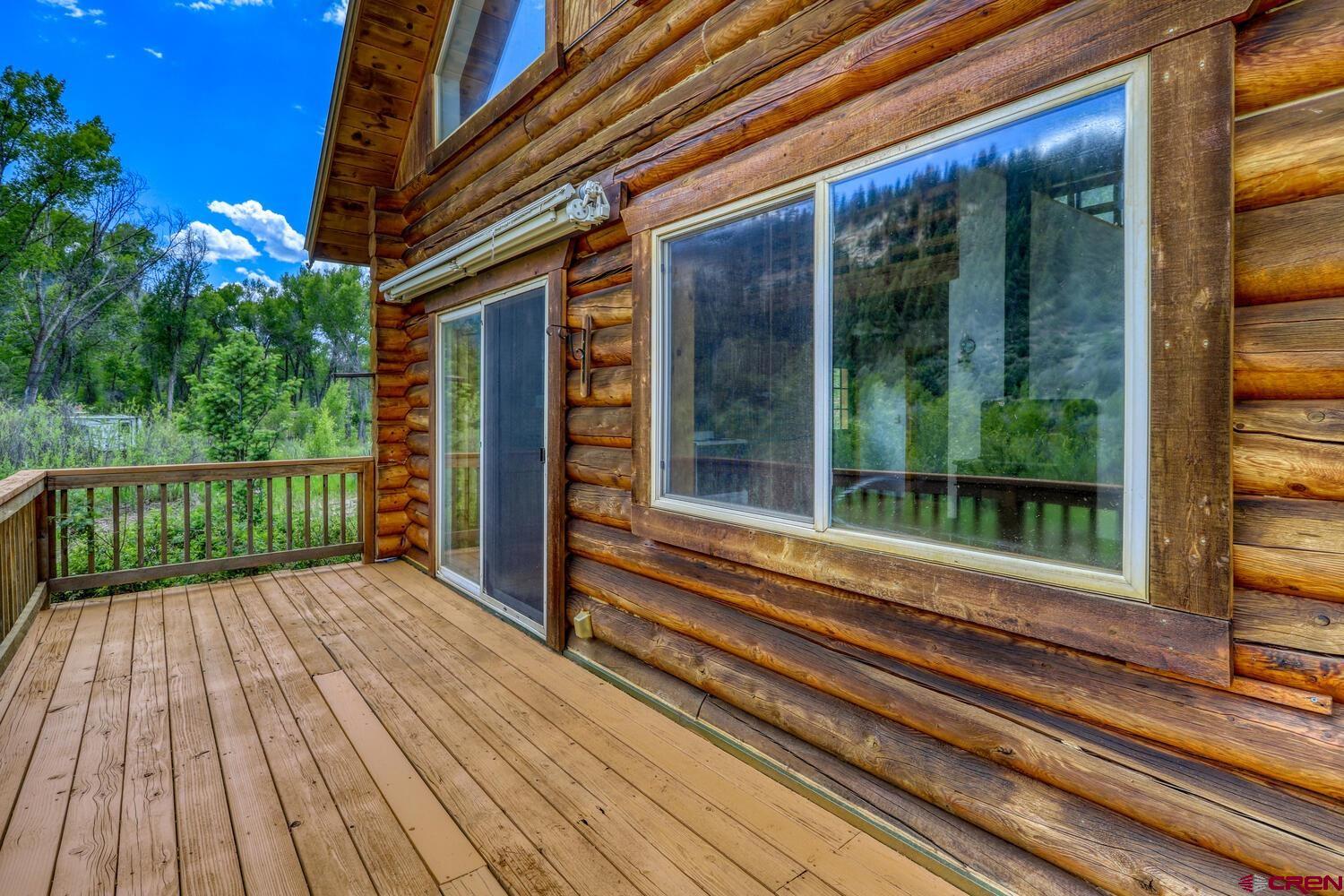 454 Estates Circle Road Pagosa Springs, CO 81147 - Photo 23 of 35 a view of a house with a large window