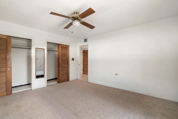 a kitchen with stainless steel appliances a stove a refrigerator sink and cabinets