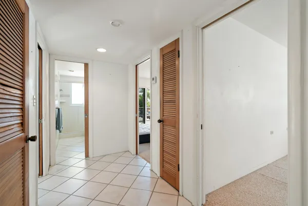 a kitchen with a sink stove and microwave