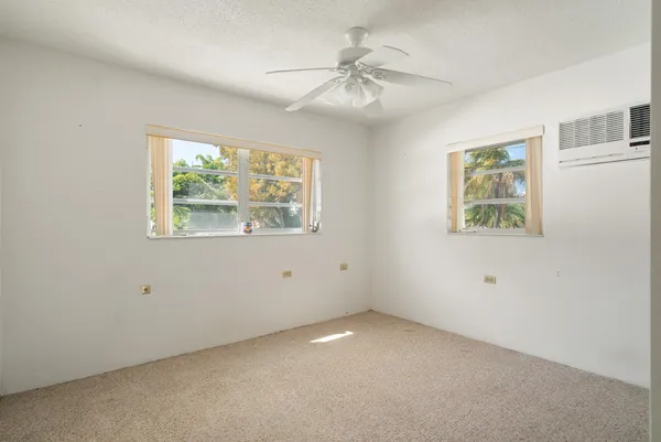 a view of a lake with a house