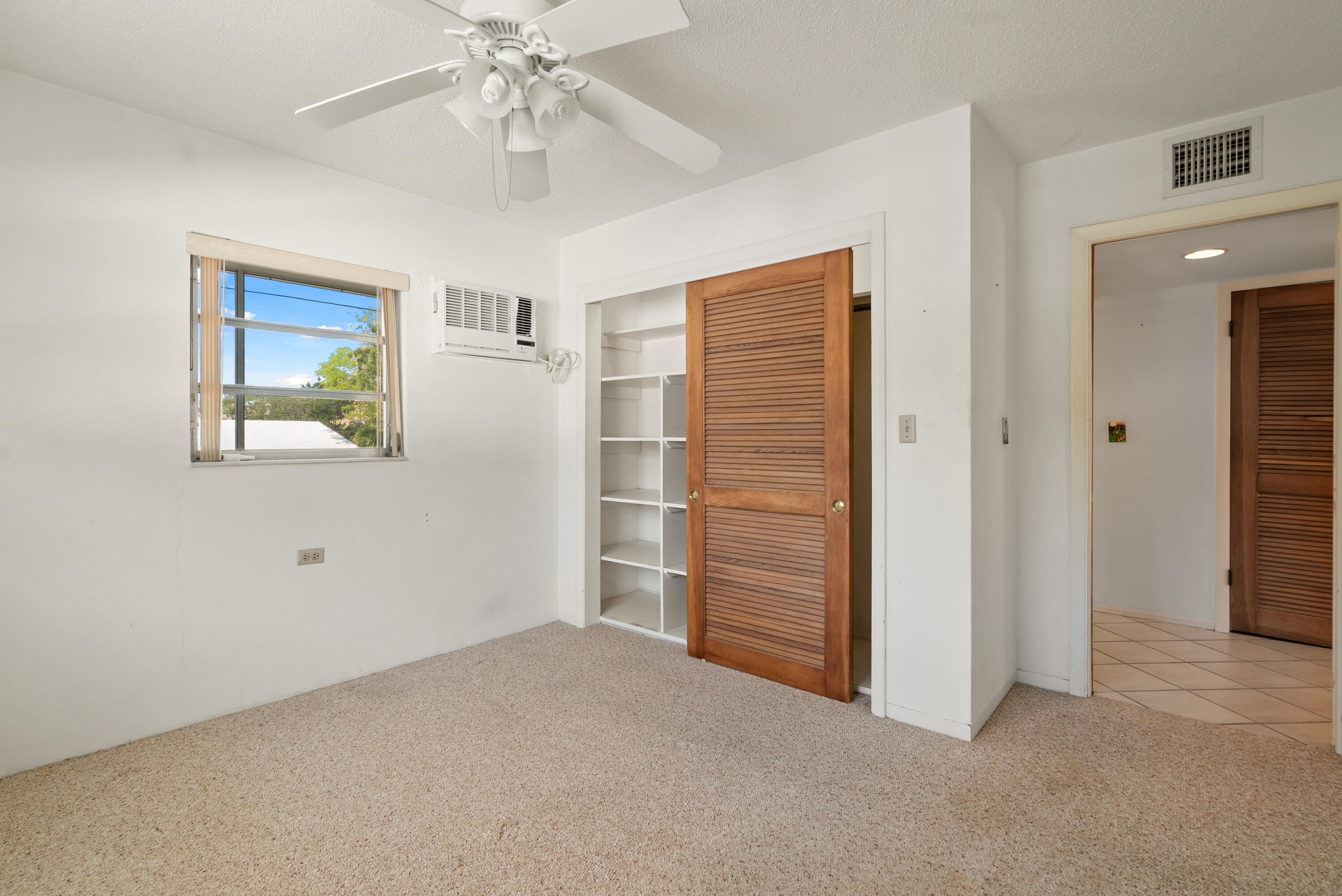 234 Mohawk Street Tavernier, FL 33070 - Photo 18 of 61 a view of empty room with ceiling fan