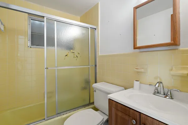 a house with palm tree in front of it