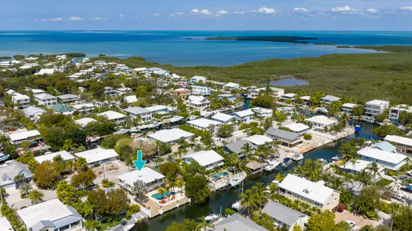 a view of a backyard of the house