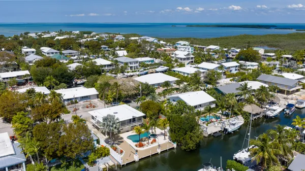 a view of a lake with trees