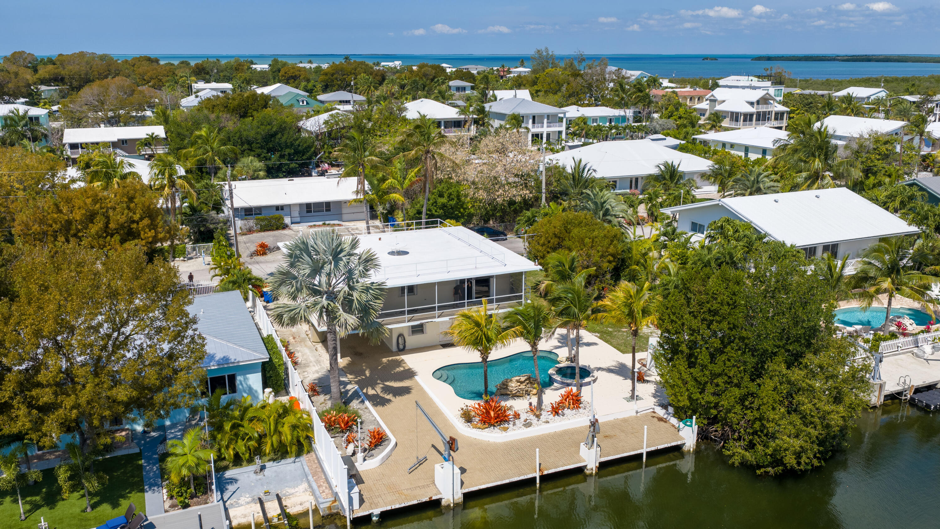 234 Mohawk Street Tavernier, FL 33070 - Photo 46 of 61 an aerial view of residential houses with outdoor space and swimming pool