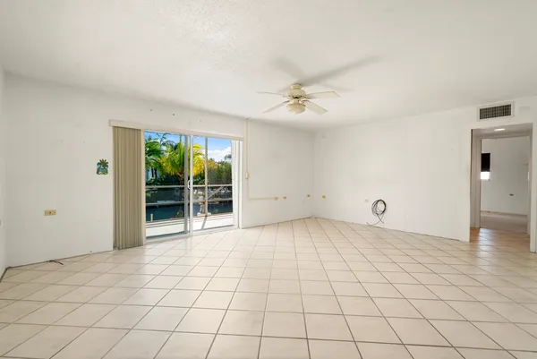 a view of an empty room and window
