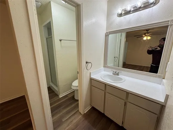 a bathroom with a sink and toilet