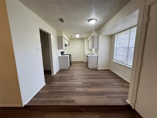 a view of kitchen and utility room