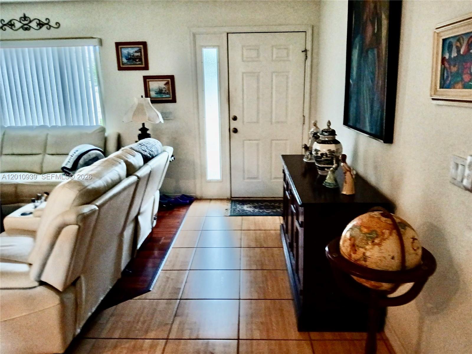 5880 Southwest 102nd Street Ocala, FL 34476 - Photo 2 of 17 a living room with a couch