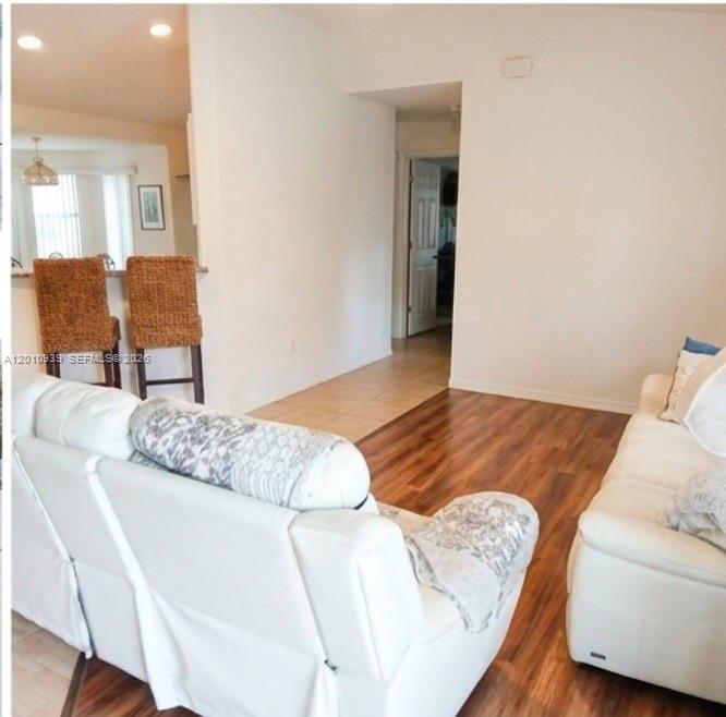 5880 Southwest 102nd Street Ocala, FL 34476 - Photo 4 of 17 a living room with furniture and a couch