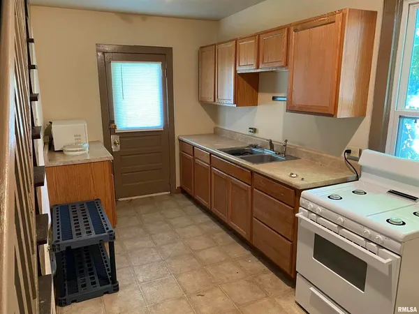 a bathroom with a toilet and a sink