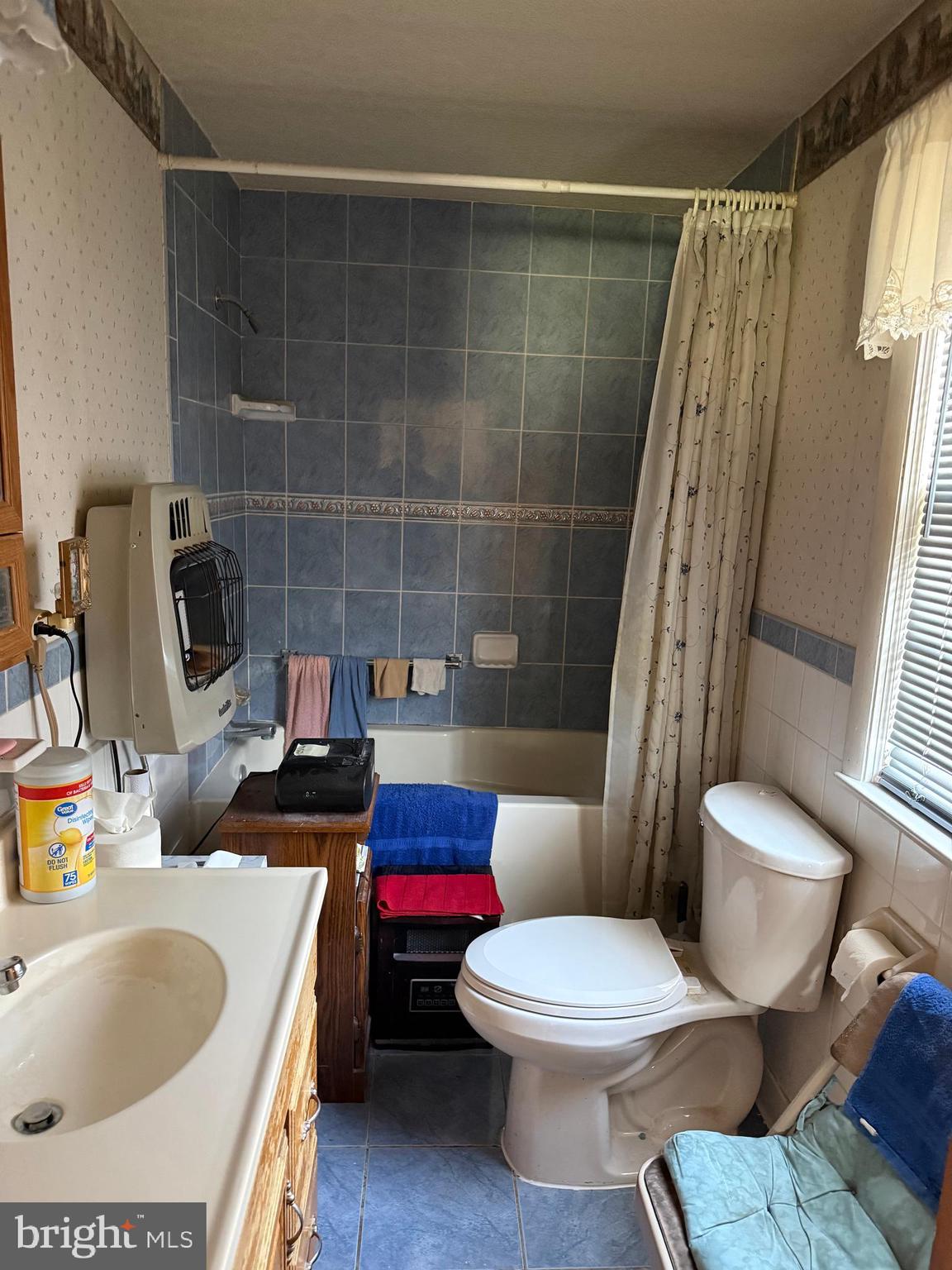 3467 Poor House Road Martinsburg, WV 25403 - Photo 11 of 23 a bathroom with a sink toilet and shower