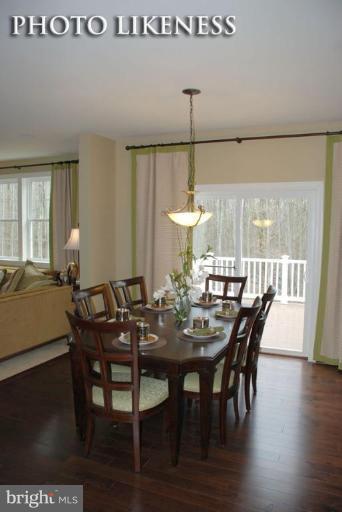 4233 Forge Road Perry Hall, MD 21128 - Photo 2 of 28 a view of a dining room with furniture window and wooden floor