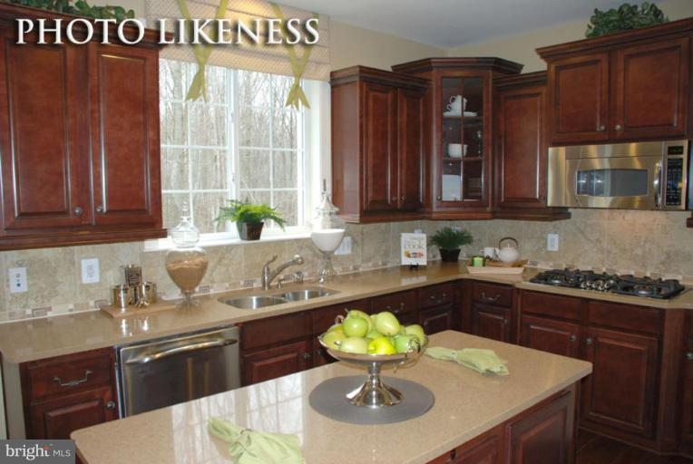 4233 Forge Road Perry Hall, MD 21128 - Photo 11 of 28 a kitchen with a sink and cabinets