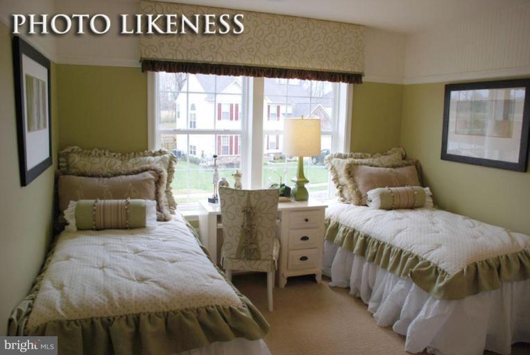 4233 Forge Road Perry Hall, MD 21128 - Photo 16 of 28 a bedroom with a bed and a couch